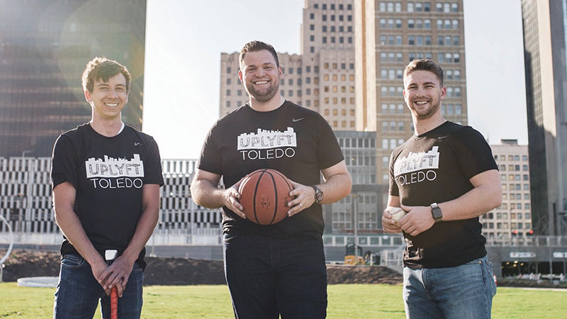 UpLyft co-founders Adam Toth and Josh Payzant with founder Bill Laranga